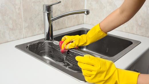 Sparkling clean kitchen sink after effective cleaning routine